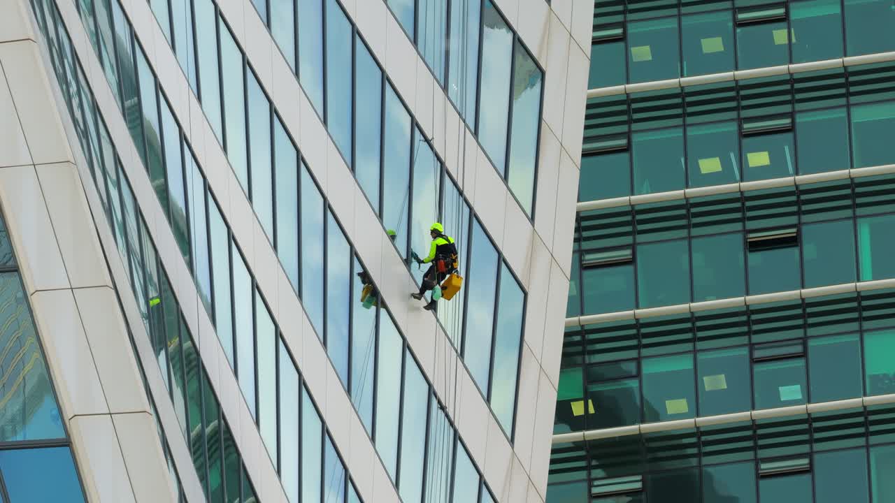Professional Window cleaners at work.