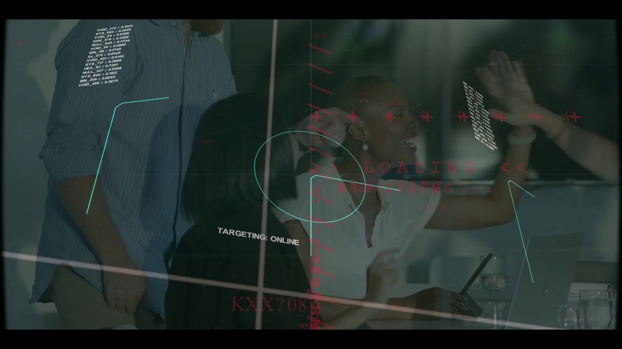 Business lead tapping tablet, using HUD reticle centering her, confirming success, team cheering