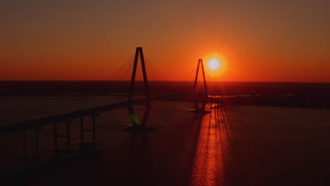stunning sunset over the arthur ravenel jr. bridge in charleston, south carolina