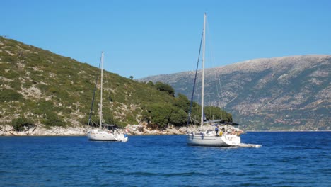 sailing boats near agia eleni beach on skiathos island - wide shot