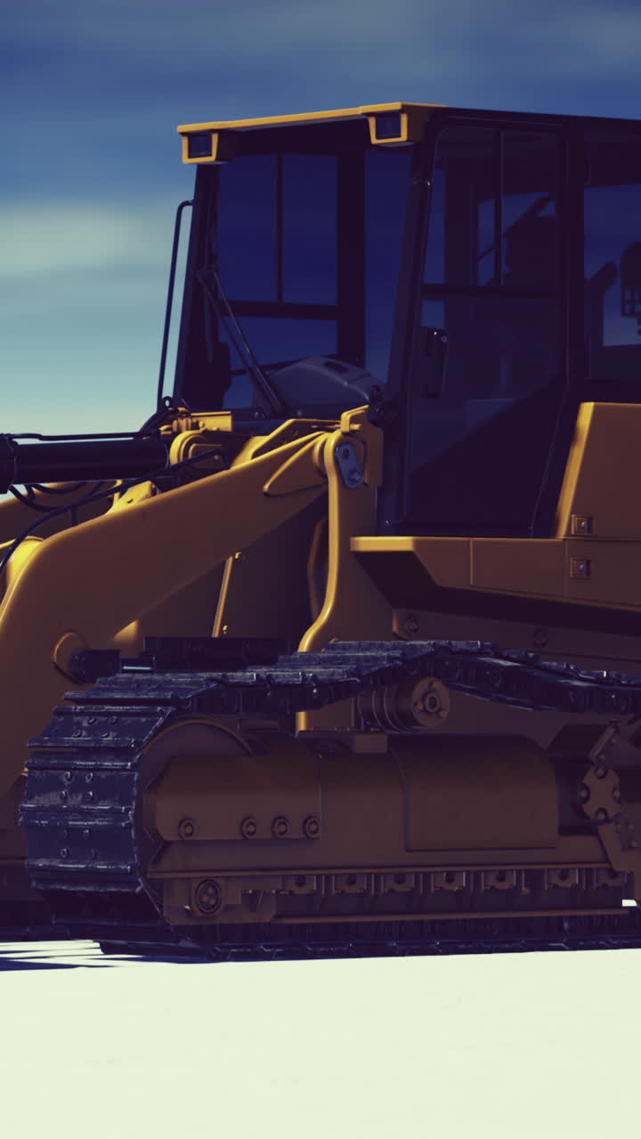 Heavy machinery at work on a snowy construction site in winter daylight