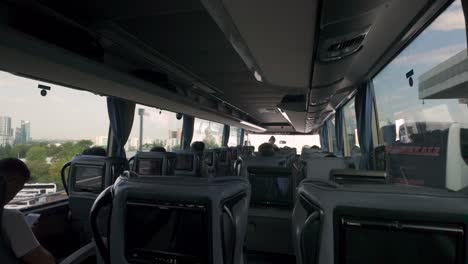 a quiet interior shot of the bus during the journey from ankara to konya, with passengers settling in for the ride.