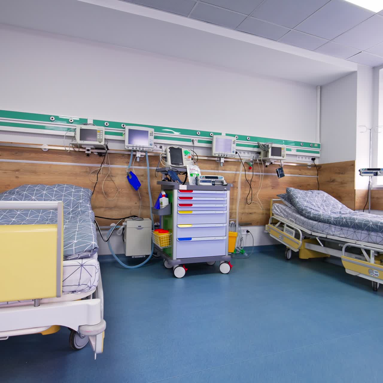 New modern wheeled beds in a ward of intensive care. Resuscitation unit with all the necessary advanced equipment for patients' reanimation