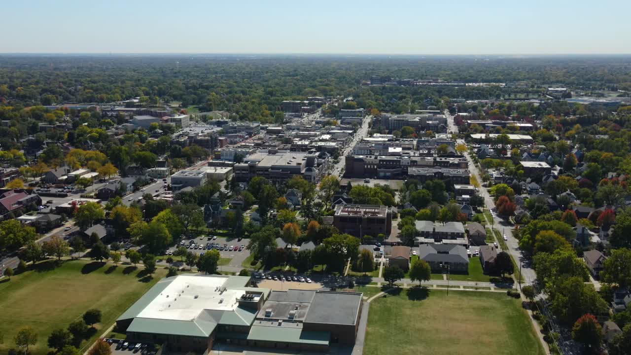 Naperville, IL, a Chicago suburb, on a sunny fall day, featuring buildings, streets. Crane Up Day S