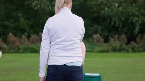 golf lesson on the green