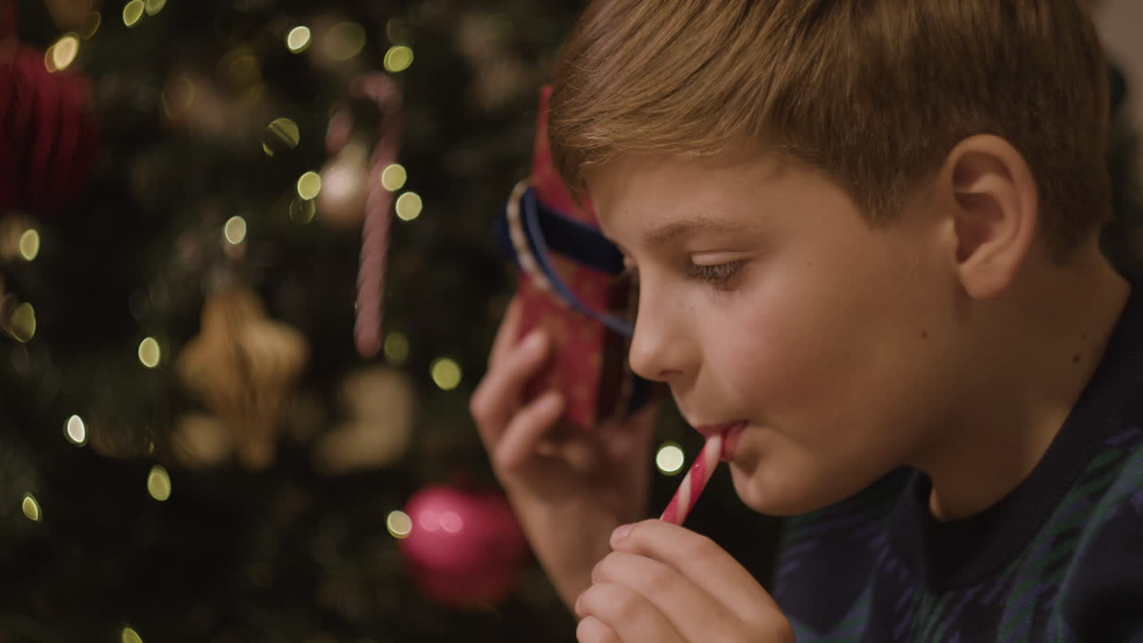 Christmas tree with presents and children