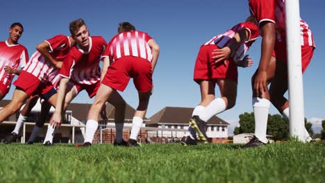 rugby players training on the field