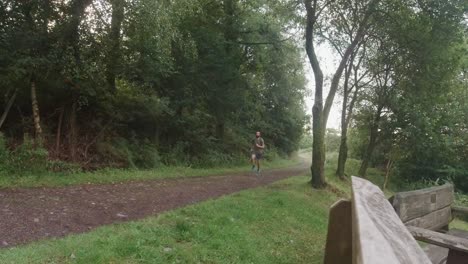 Trail-Runner-with-Backpack-Exercising-in-Slow-Motion