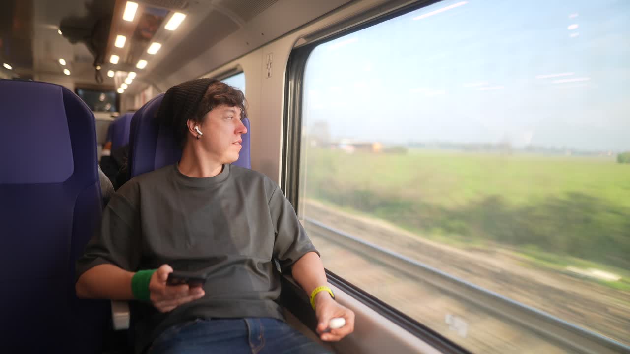 Young Person Traveling by Train