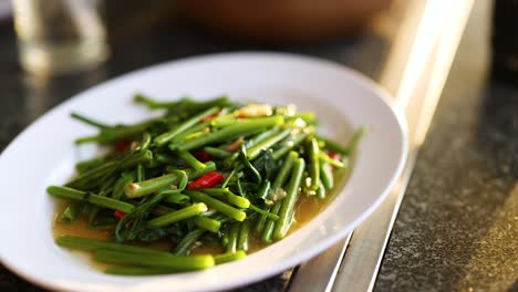 delicious thai dish served on a white plate