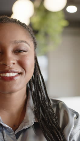 vertical video portrait of happy african american casual businesswoman, slow motion