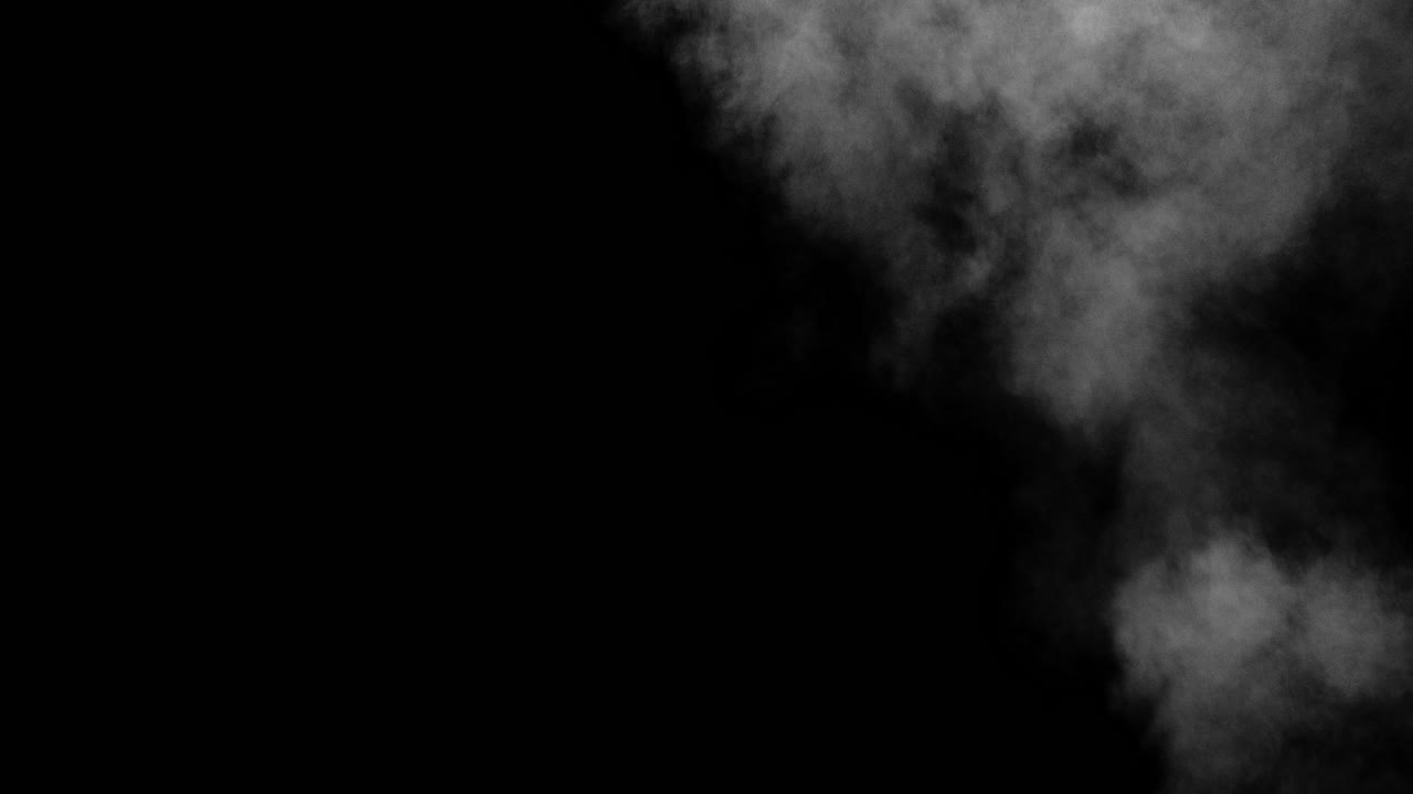 화면 오른쪽에서 먼지 구름이 분출하고 검정색 배경에서 화면 오른쪽 위로 표류합니다.