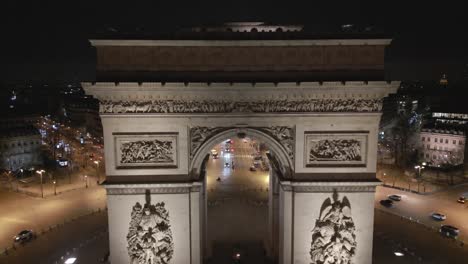 triumphal arch illuminated at night, paris in france