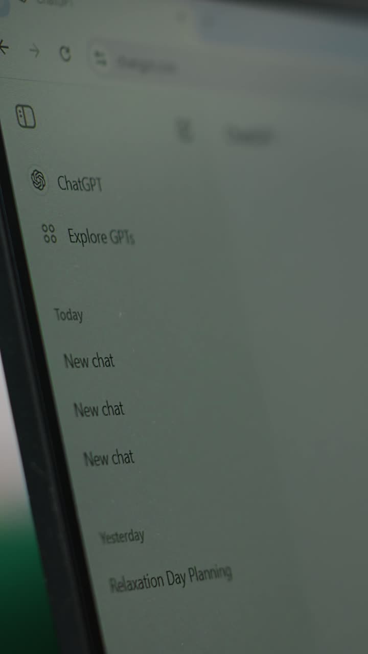 Vertical Video Bucharest, Romania - July 30th 2024 - Man uses futuristic AI chat on software