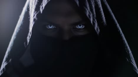 mysterious hooded figure