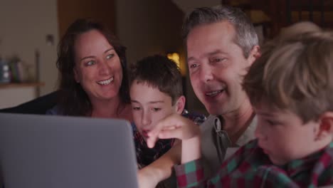 family spending time together at home in the evening