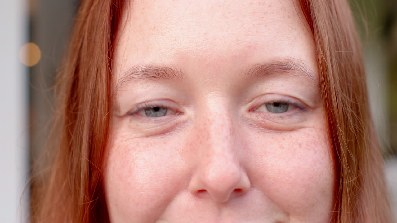 Close-up of person's face, focusing on eyes and facial expression