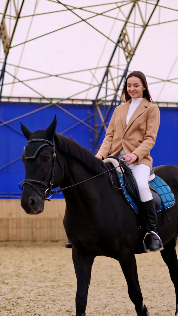 Riding on the horseback. Learning horse sport riding. Vertical video