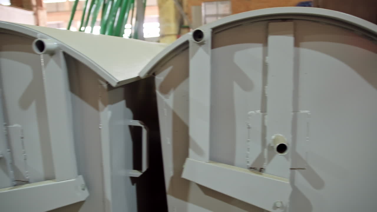 Metal garbage cans. Row of gray iron garbage cans