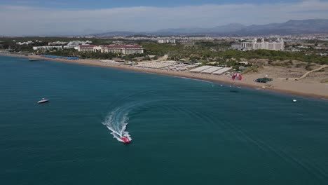 sea by speedboat parachute