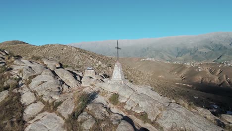 cerro de la cruz in tafí del valle viewed by a drone at a beautiful sunrise