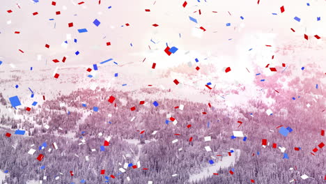 red, blue, and white confetti animation over snowy mountain landscape