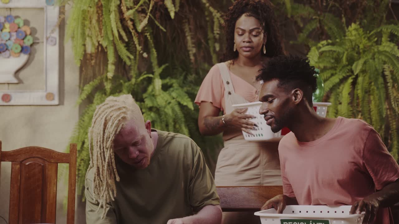 Diverse Group Engages in Plastic Recycling at Home