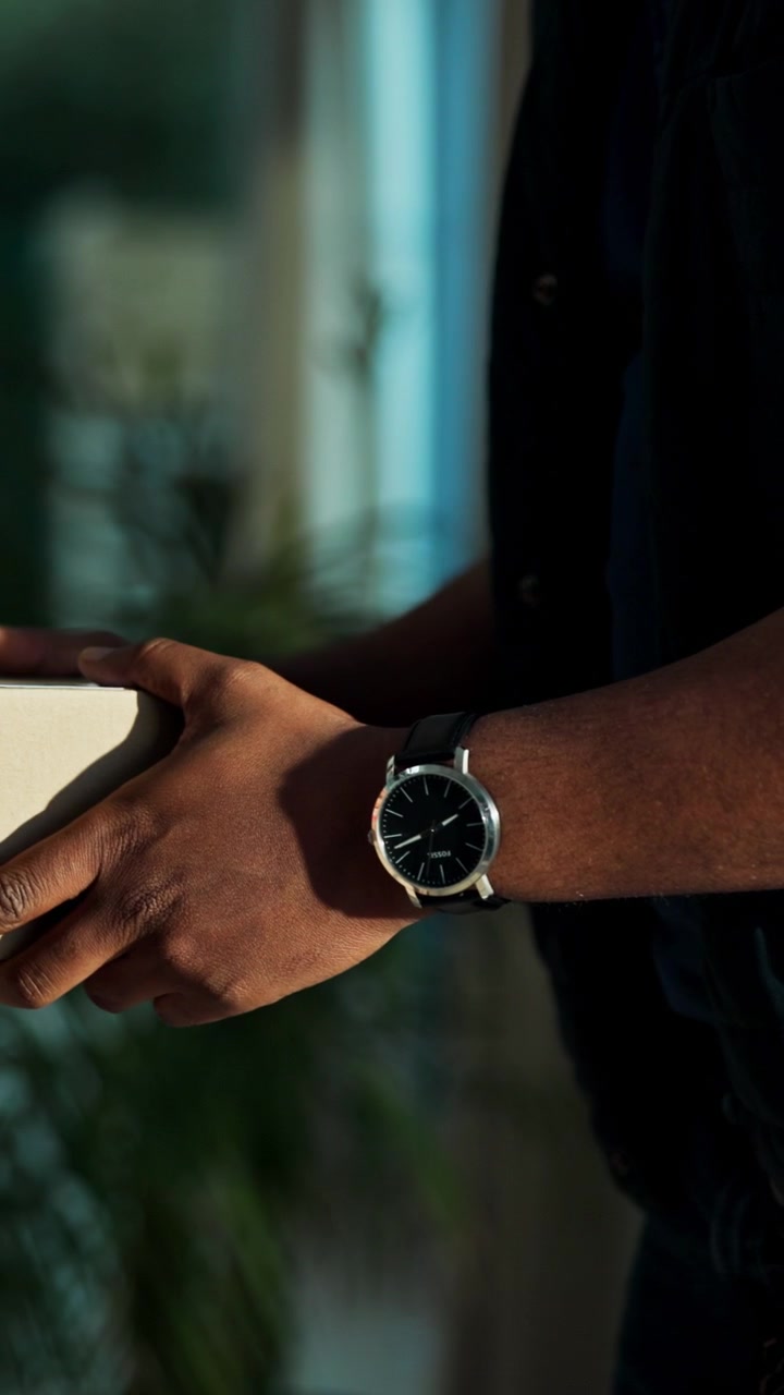 Person Handing Over a Fragile Package