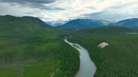 Flathead-River-Aerial-View-With-Densely-Forest-And-Mountain-Ridges-In-Montana