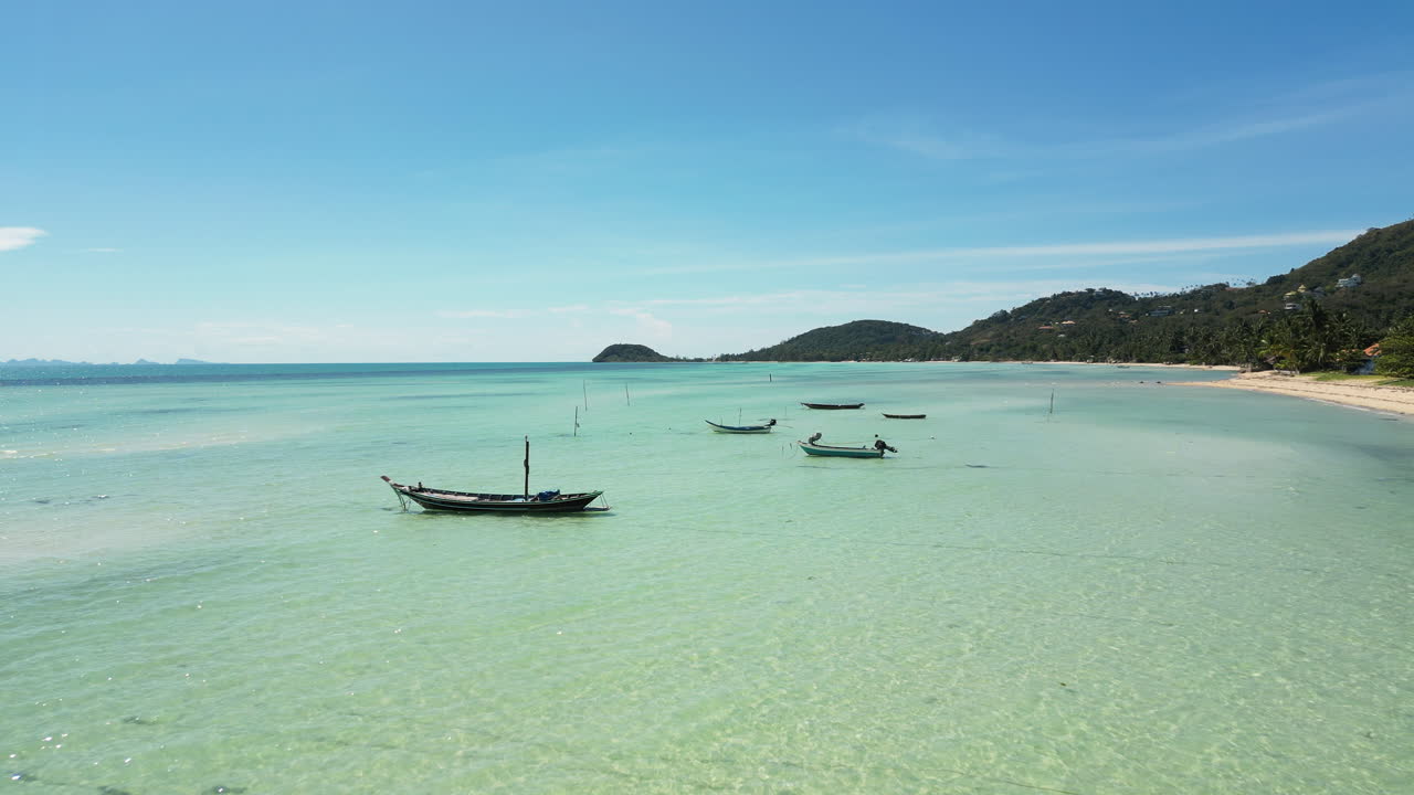 drone fly above pristine clear water in tropical paradise Thailand travel holiday destination in mae Nam coast in Koh samui south east Asia