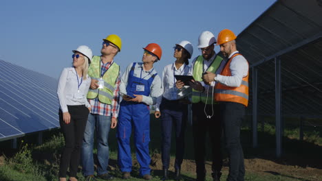 solar panel farm maintenance team