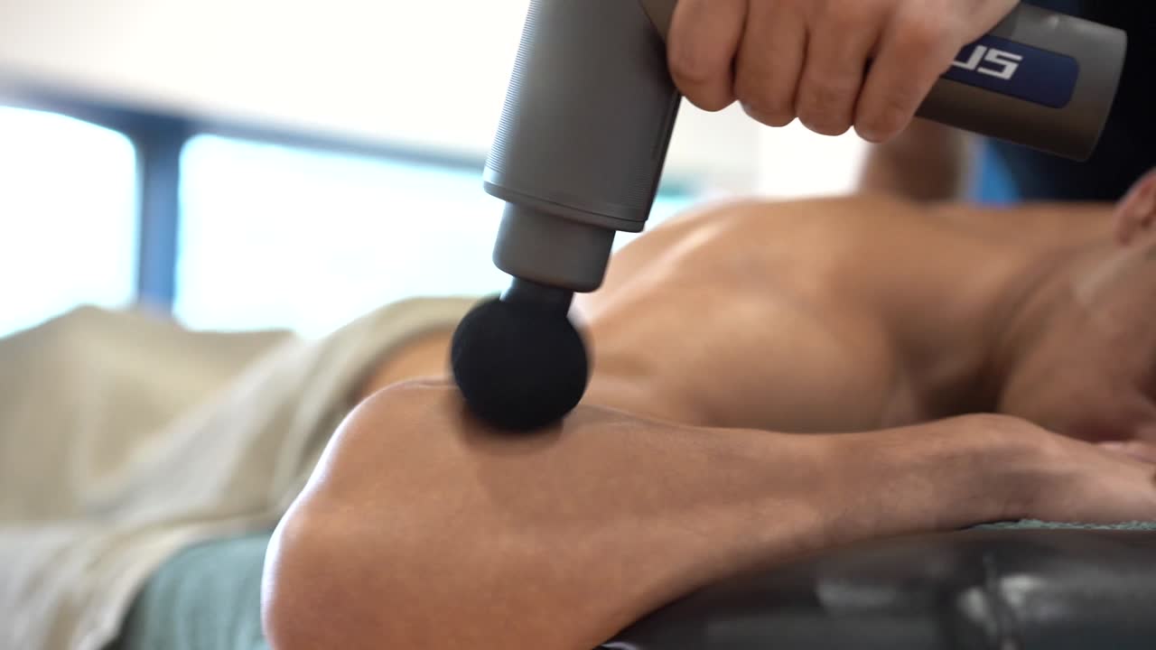 Massage with massage gun