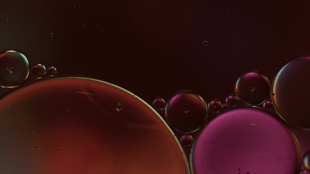 Abstract Colorful Food Oil Drops Bubbles and spheres Flowing