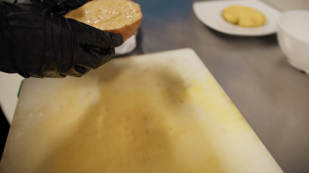 Preparation Of The Burger Bread Inside A Professional Kitchen