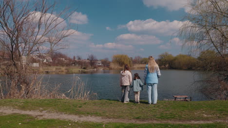 family at the pond