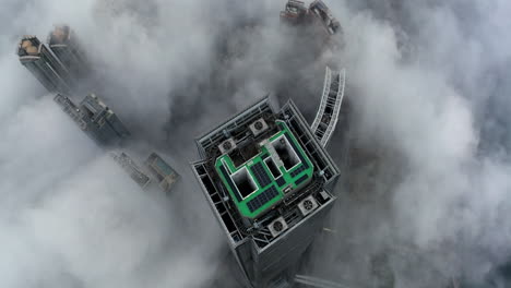 rooftop of icc building in west kowloon in hong kong during ground fog