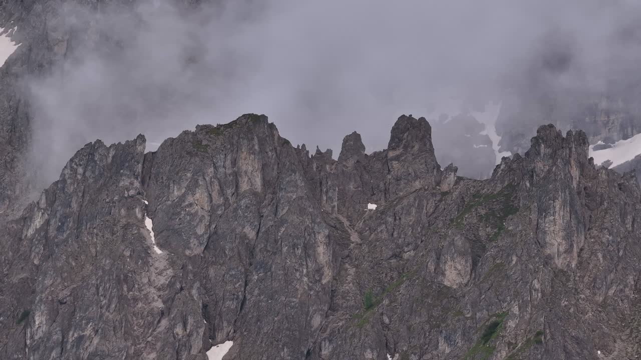 Majestic Mountain Peaks shrouded in Fog