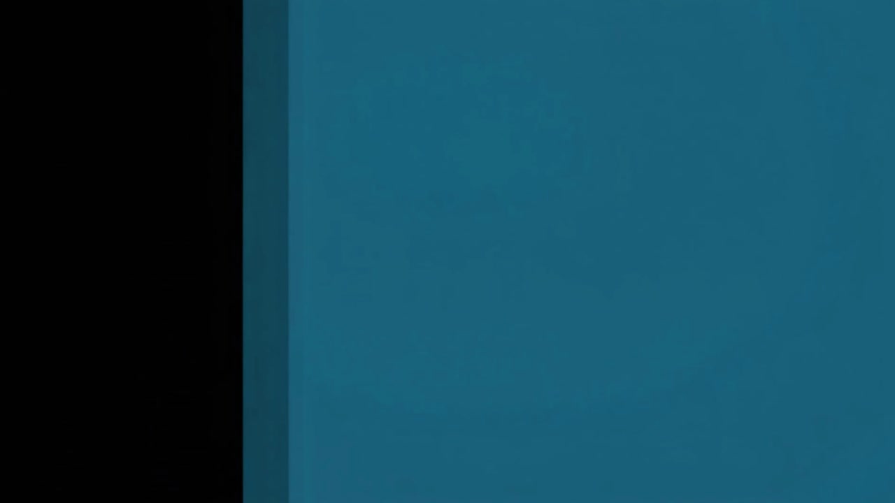 Abstract Transition with Black and Teal Color Blocks