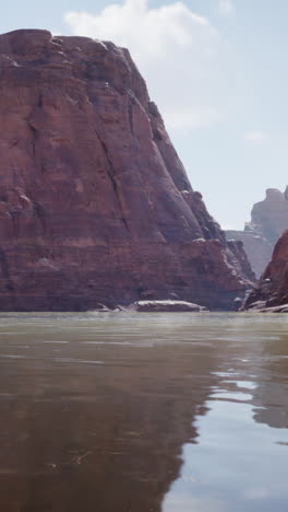 a stunning view of a canyon with a river flowing through it