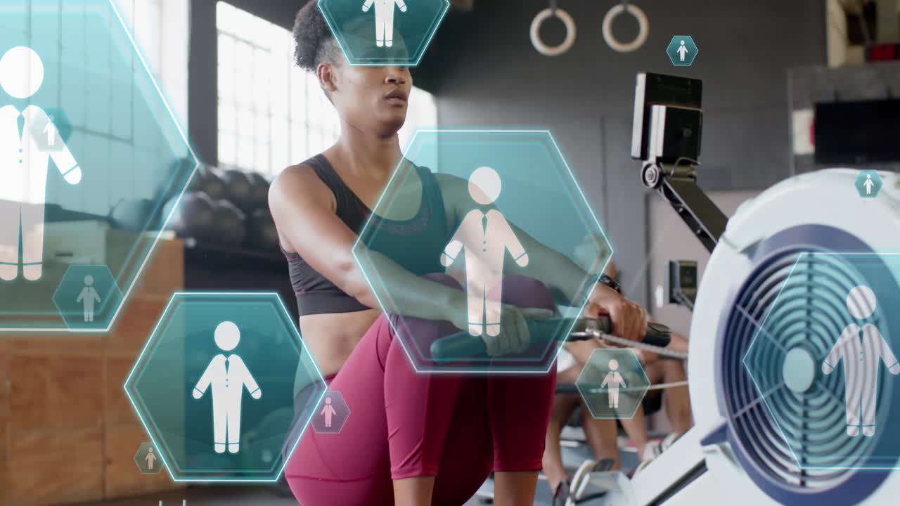 animación de personas íconos sobre entrenamiento de grupo diverso en máquinas de remo en el gimnasio