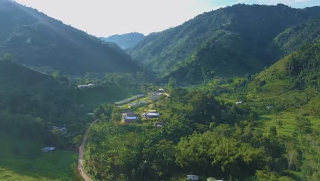 aerial view of a mountain village in a lush green valley
