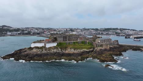 drone shot of castle cornet in front of st