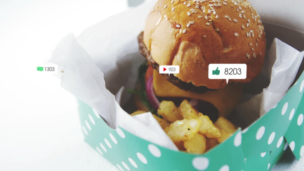 Badges coming from right drifting left pan-zoom revealing burger+fries in green box gaining likes
