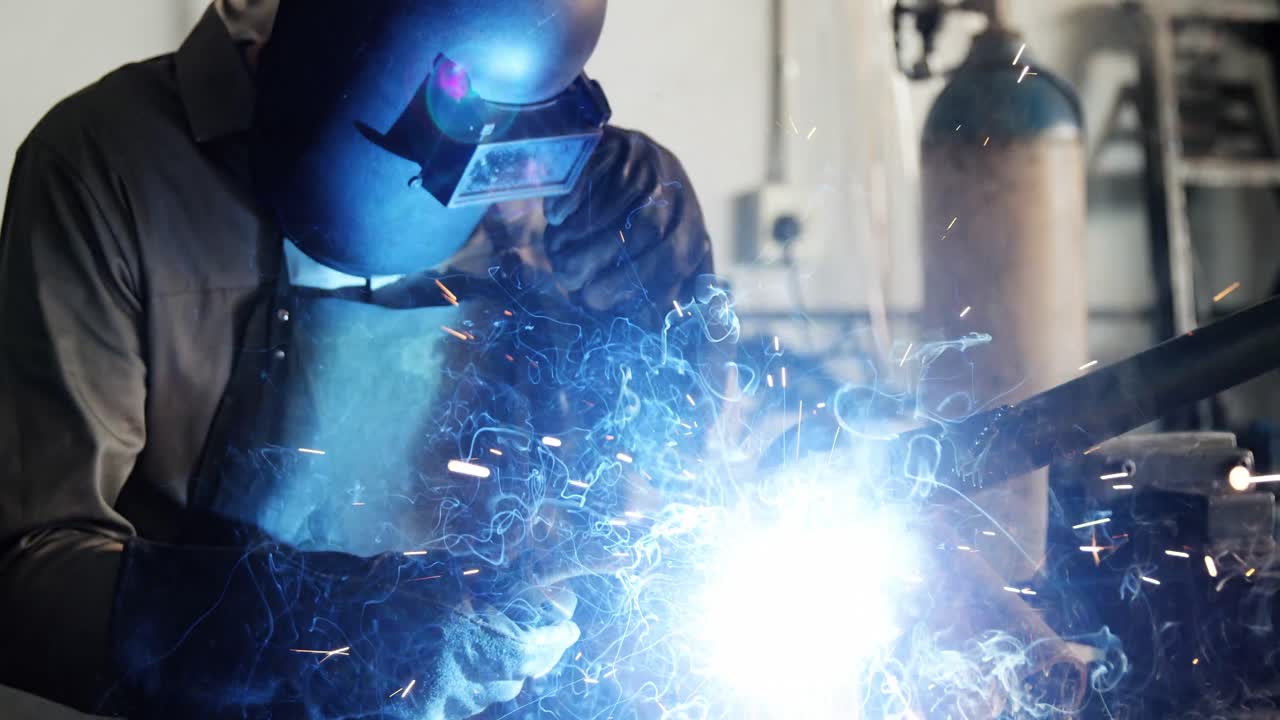 Welder welding a metal