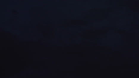 continuous lightning activity during dark stormy night