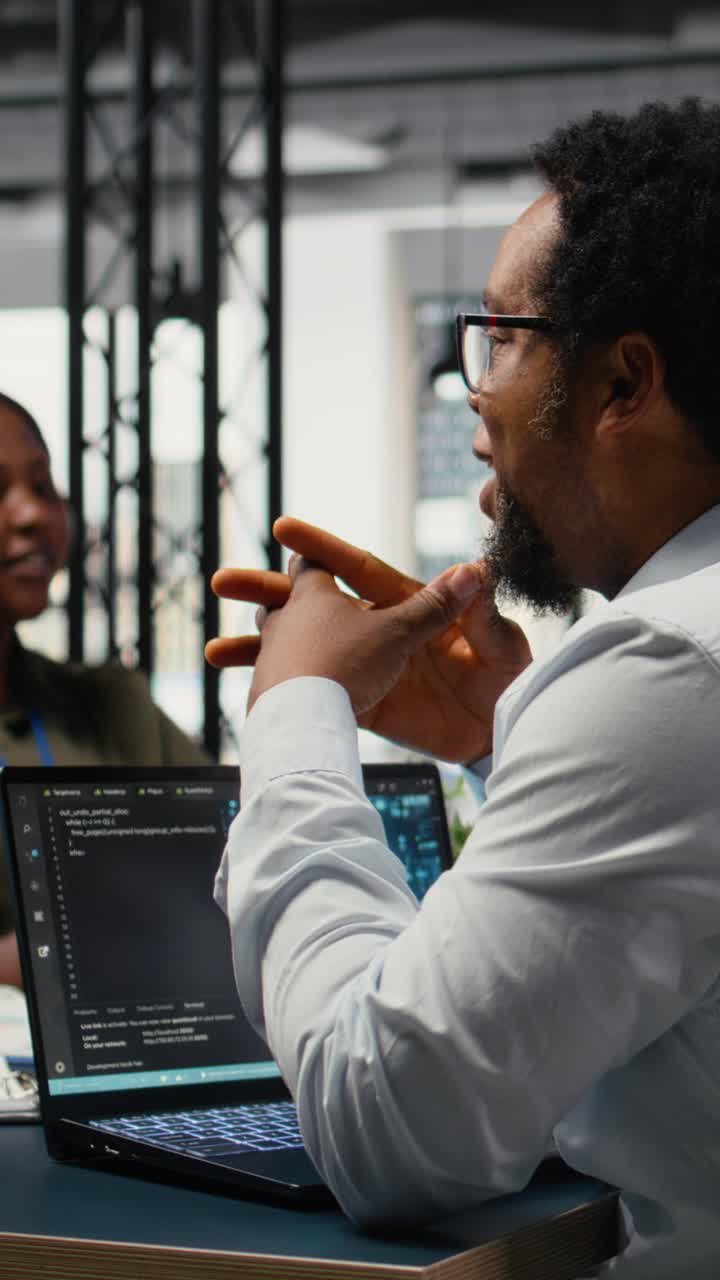 Vertical video Data scientists in startup office brainstorming leveraging AI tech