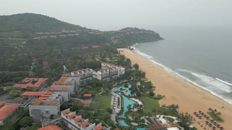 Swimming-Pool-And-Resort-In-Laguna-Lang-Co-Central-Vietnam-Drone-Rise-Pull-Back