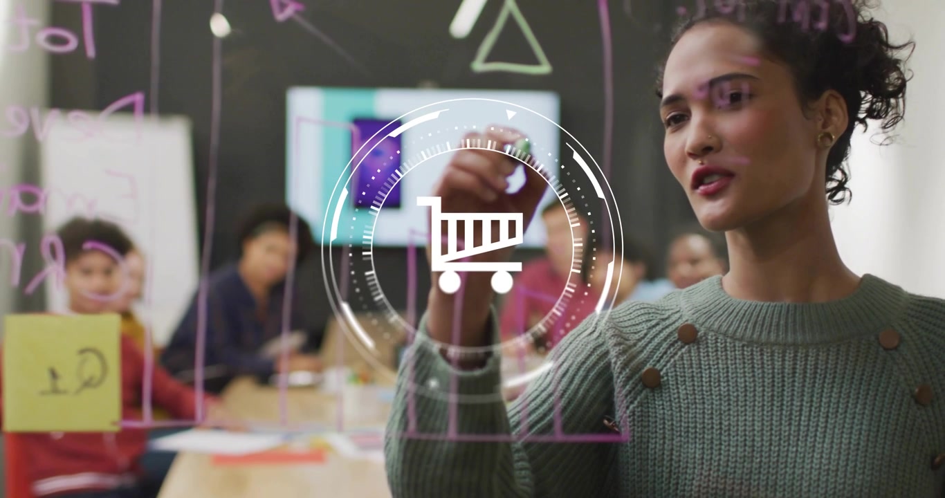 Presenter drawing on glass board in sales meeting activating cart icon gauge showing sales trends