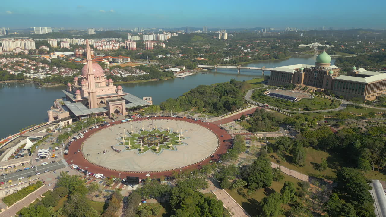 Putrajaya Mosque And Parliament House With Giant Roundabout Kuala Lumpur Malaysia Drone Pull Back 4K 60FPS