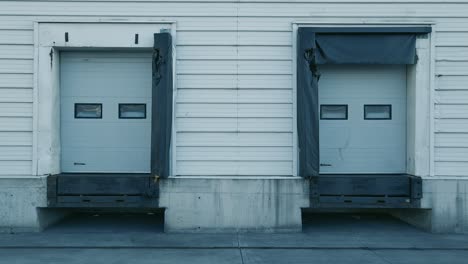 clear loading bays of a warehouse in dublin, ireland - drone shot